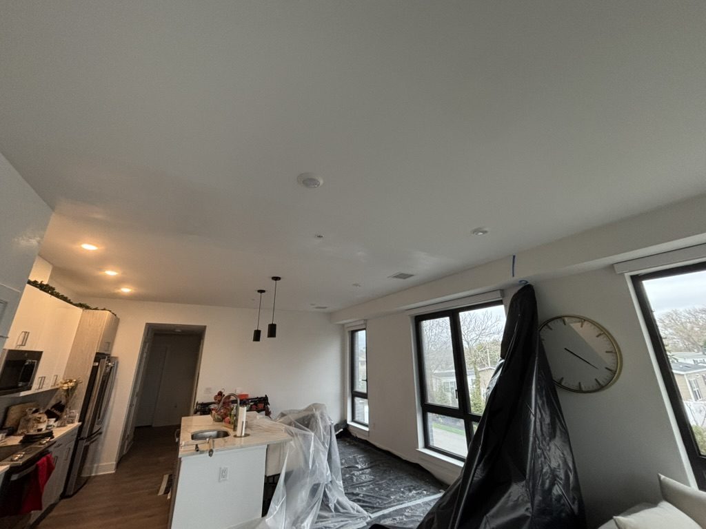 Occupied-unit ceiling repair with furniture protected